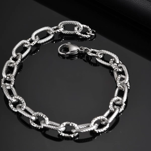 Detailed view of interconnected textured and smooth steel links with lobster clasp closure