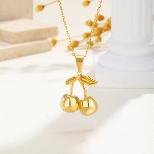 Polished 18K gold stainless steel cherry pendant necklace with minimalist O-chain