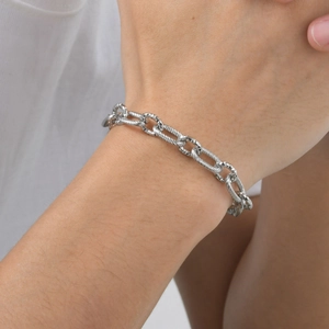 Men's minimalist stainless steel interlocking link bracelet with textured silver rings