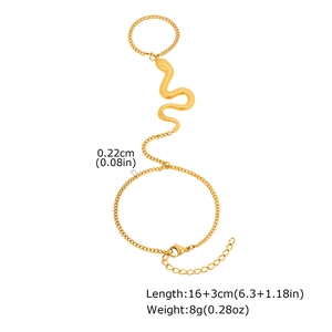 Detailed view of golden snake slave bracelet with engraved scales and adjustable chain