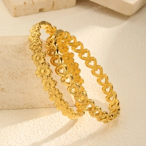 Elegant 18K gold-plated open bangles with hollow heart and floral relief designs