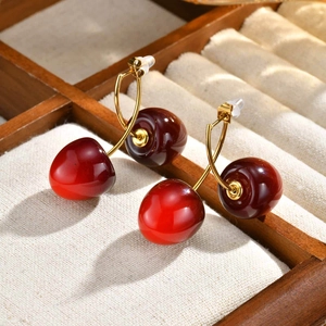 Sweet cherry pendant drop earrings in polished gold stainless steel and red resin finish