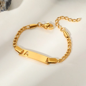 Detail of 18k gold plated stainless steel bracelet with cutout A letter and lobster clasp
