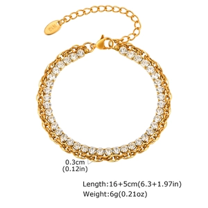 Detail of 18K gold braided chain with white cubic zirconia and K18 hallmark tag