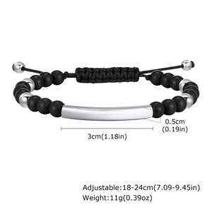 Detail view of adjustable matte black beaded bracelet with dimensions and silver metal bar