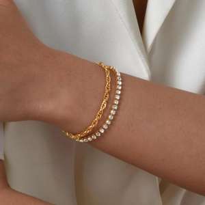 Double-layered 18K gold braided chain bracelet set with sparkling white zircon stones