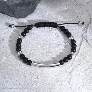 Men's matte black agate bead bracelet with silver curved tube and adjustable cord