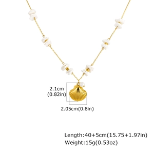 Detail showing dimensions of gold shell necklace with white shell fragments and small pearl