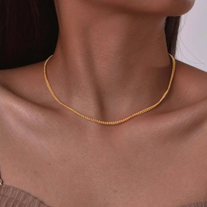 18K gold-plated double-layer ball chain necklace worn by a model to show elegant style