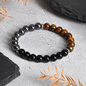 Men's natural tiger eye and obsidian beaded bracelet with metallic spacers on stone base