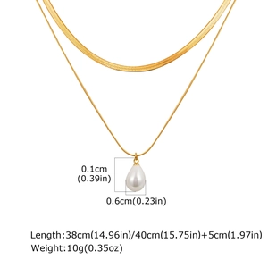 Detail of gold double-layer necklace with pearl pendant and adjustable chain sizing