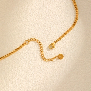 Detail of gold-plated stainless steel chain with S.steel hallmark and lobster clasp closure