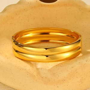 Polished 18K gold-plated double-layer stainless steel bangle with mechanical hinge