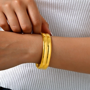Polished 18K gold-plated stainless steel double-layered cuff bracelet for women