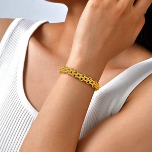 Unisex gold three-row embossed watchband style bracelet with industrial retro links