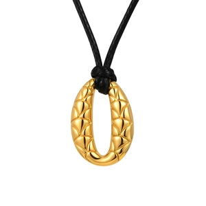 Elegant gold oval pendant necklace with woven texture on a black adjustable cord