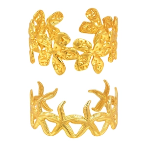 Golden irregular starfish flower cuff bracelet set in ocean-themed stainless steel