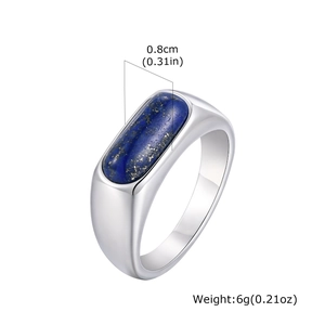 Detailed view of polished oval lapis lazuli stone set on a steel ring band