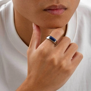 Polished stainless steel men's ring with rectangle blue lapis lazuli on finger