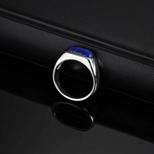 Polished stainless steel ring for men featuring an oval lapis lazuli stone inlay