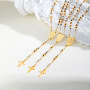 Three-tone stainless steel rosary necklace with Madonna medal and cross pendant charms
