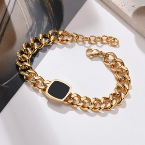 Golden chunky chain bracelet with square black enamel pendant and lobster clasp for women