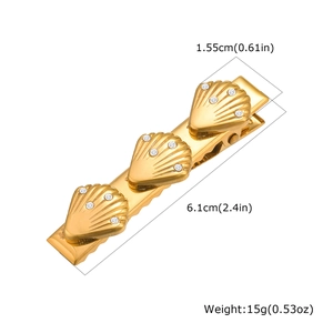 Detailed view of golden shell hair clip dimensions measuring 6.1cm in length and 15g weight