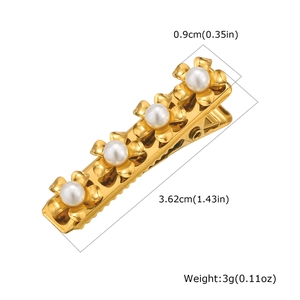 Detailed view of golden flower hair clip with pearls measuring 3.62cm in length