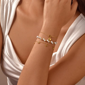 Bracelet en Acier Inoxydable Plaqué Or 18K Cœur Nœud Künstliche Perles Pour Femmes Élégant Style Français Bijoux Zircone