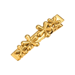 Elegant gold flower hair clip with pearl-inspired shell petals on stainless steel base