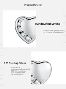 Detailed macro view of 925 sterling silver heart earring with 5A cubic zirconia stones