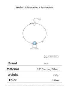Détail macro d'un bracelet en argent S925 avec pendentif rond en pierre bleue claire