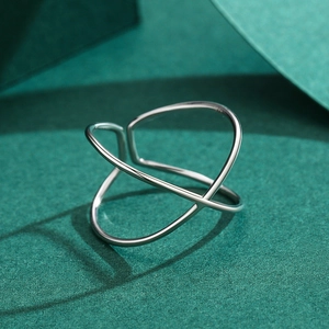 Minimalist S925 sterling silver ring featuring a geometric cross design on a green base