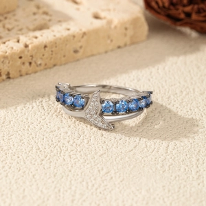 Elegant S925 silver mermaid tail ring with blue crystals and sparkling white zircons