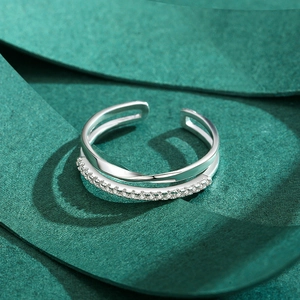 Double layered S925 sterling silver cross ring with polished band and pavé cubic zirconia