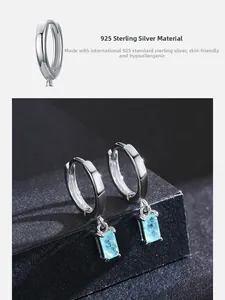 Detailed view of s925 silver earrings with rectangular blue tourmaline gemstone drops