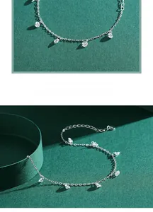 Close-up of sterling silver zircon bracelet with round clear gems and adjustable chain