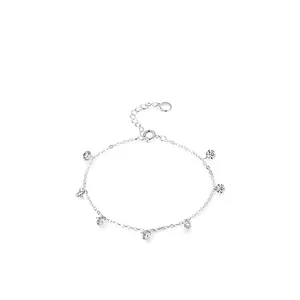 Minimalist 925 sterling silver chain bracelet featuring seven round cubic zirconia charms