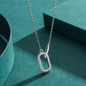 Elegant sterling silver necklace with double interlocking pavé rectangle pendant