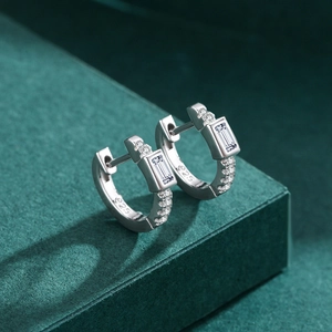 Elegant S925 sterling silver hoop earring with rectangular zircon on green velvet stand