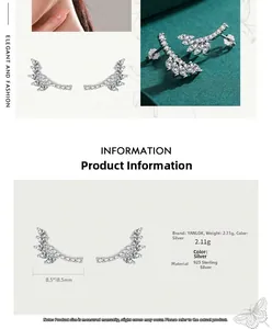 Detailed view of sterling silver wing earrings with white zircon and size measurements
