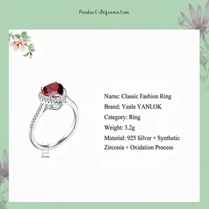 Classic 925 sterling silver ring with heart-shaped red gemstone and white zirconia