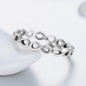 Elegant infinity symbol band ring in silver finish with minimalist hollow design