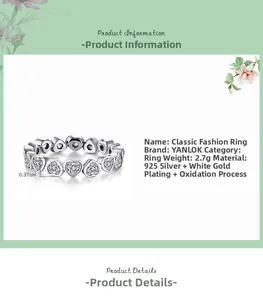 Vue détaillée de la bague en argent 925 en forme de cœur avec placage en or blanc oxydé