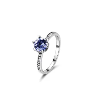 Classic S925 sterling silver ring with round blue zircon stone in six-prong setting