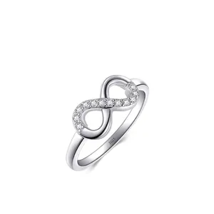 S925 sterling silver infinity ring with micro-paved cubic zirconia stones on white background