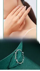 Detail of s925 silver wave ring with micro-pave zircon on green velvet background