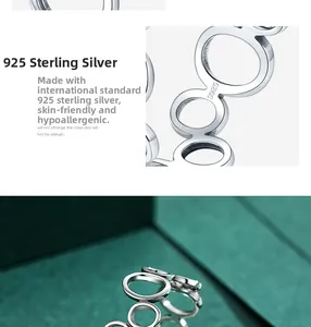 Macro detail of S925 sterling silver interlocking circle ring with skin-friendly texture