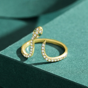 Bague serpent ajustable plaquée or 18 carats avec zircons blancs et yeux en gemmes vertes