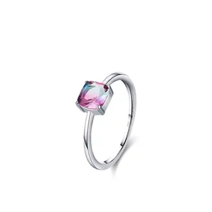 S925 sterling silver ring with square gradient tourmaline stone on a clean background